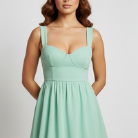 Modern solid color cutout ruffle open back dress, back view on model.