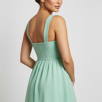 Solid color slim sling cutout backless ruffle dress, front view on model.