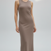 Brown sleeveless knitted dress, full length front view.