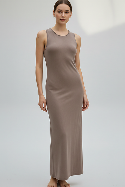 Brown sleeveless knitted dress, full length front view.