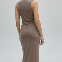 Brown sleeveless knitted dress, side view, different pose.