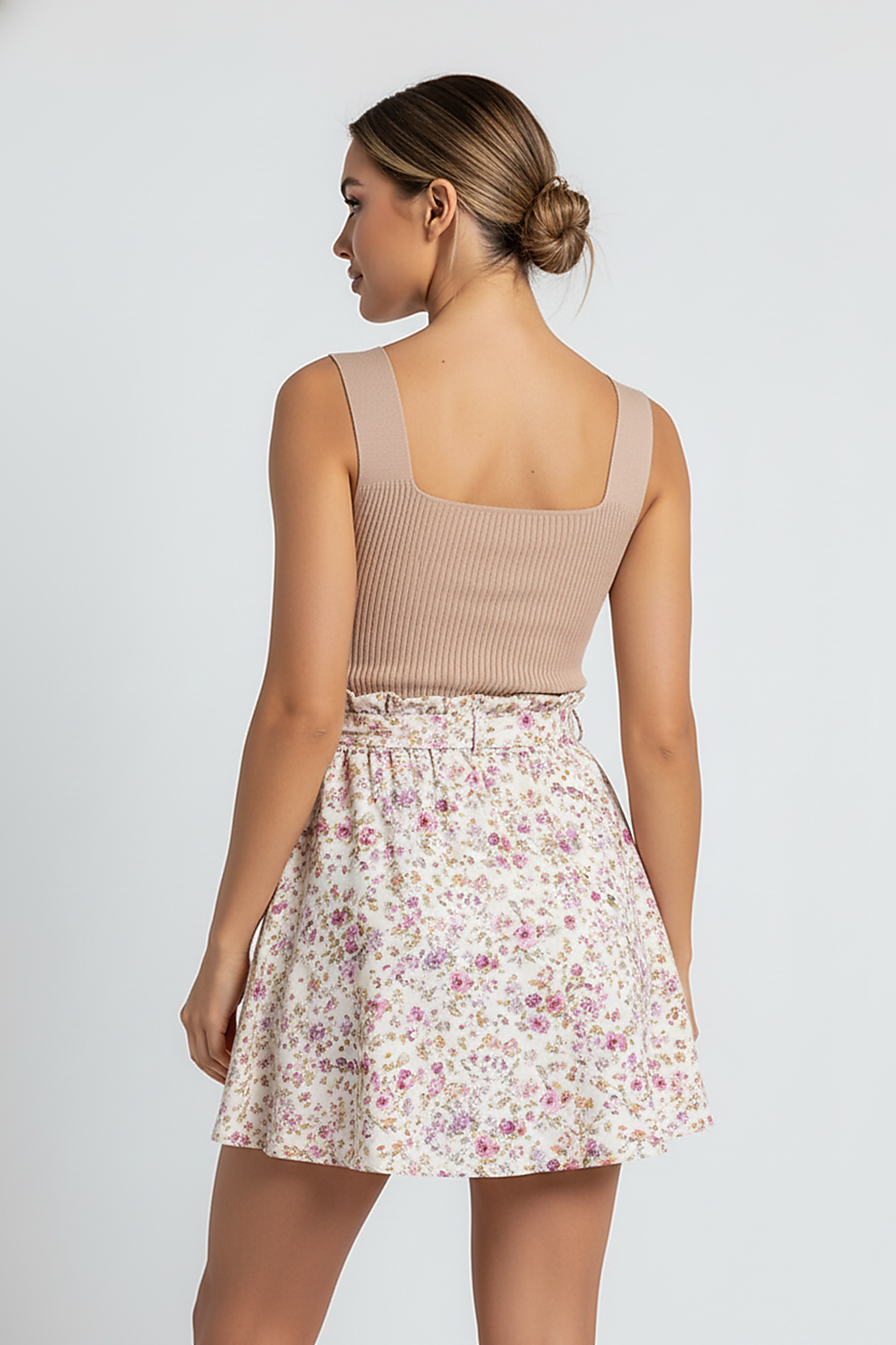 Plus-size floral knit sleeveless summer dress, chic style, front view on model.