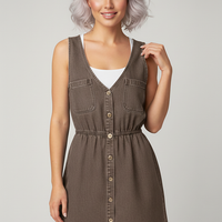 Loose fit Korean style blue denim mini dress with pockets, front view.