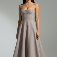 Navy midi dress, close-up of waist and skirt drape.