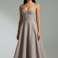 Navy midi dress, side view on model.