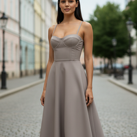 Navy midi dress, model in elegant pose.