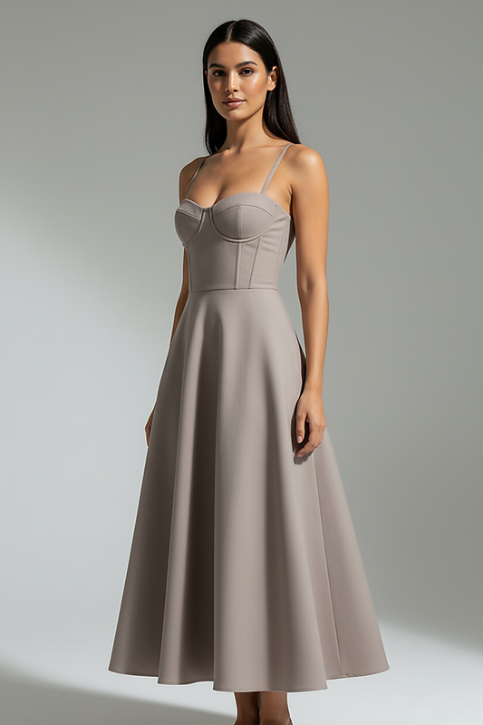 Navy midi dress, model in a relaxed standing pose.