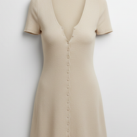 Beige knitted mini dress, front view on model.