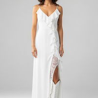 woman wearing champagne satin midi dress, front view, standing, hands relaxed