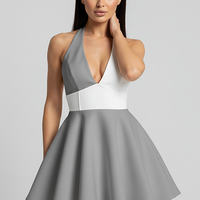 V-neck backless halter pleated mini dress, front view on model.