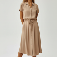 Vintage floral print dress, close-up detail.