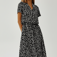 Vintage floral print dress, close-up detail.