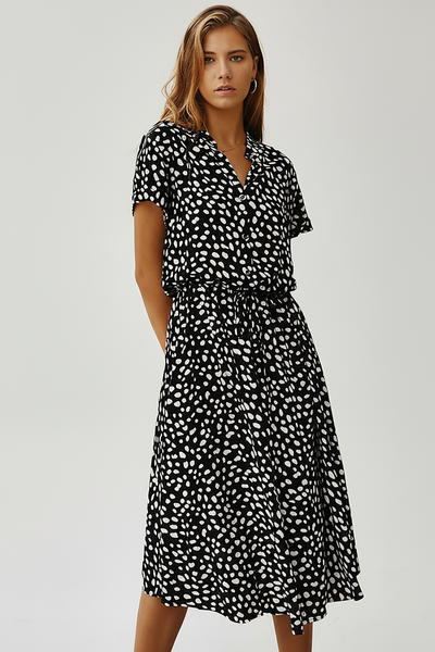 Vintage floral print dress, close-up detail.