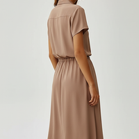 Vintage floral print dress, front view on model.