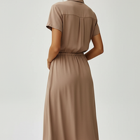 Vintage floral print dress, side view on model.