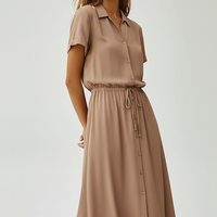 Vintage floral print dress, close-up detail.