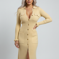 Single-breasted sweater dress, front view on model.