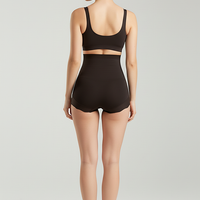 Women's high-waist slimming shorts, tummy control, back view.