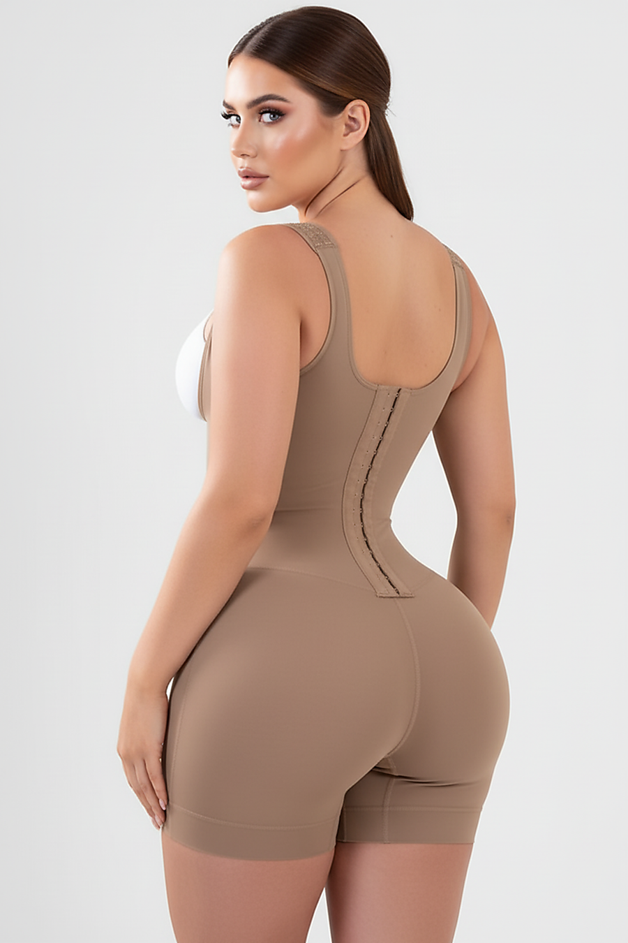 Nude tummy control faja, side view on model.