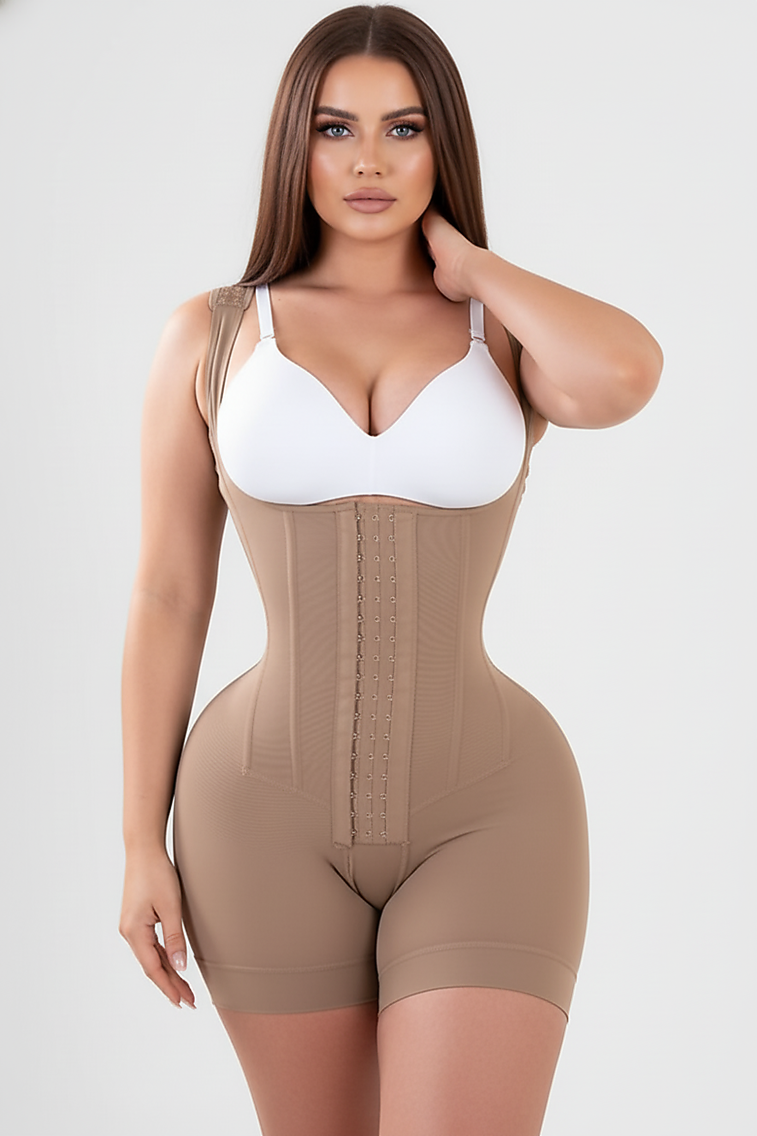 Nude tummy control body sculpting faja, side view on model.