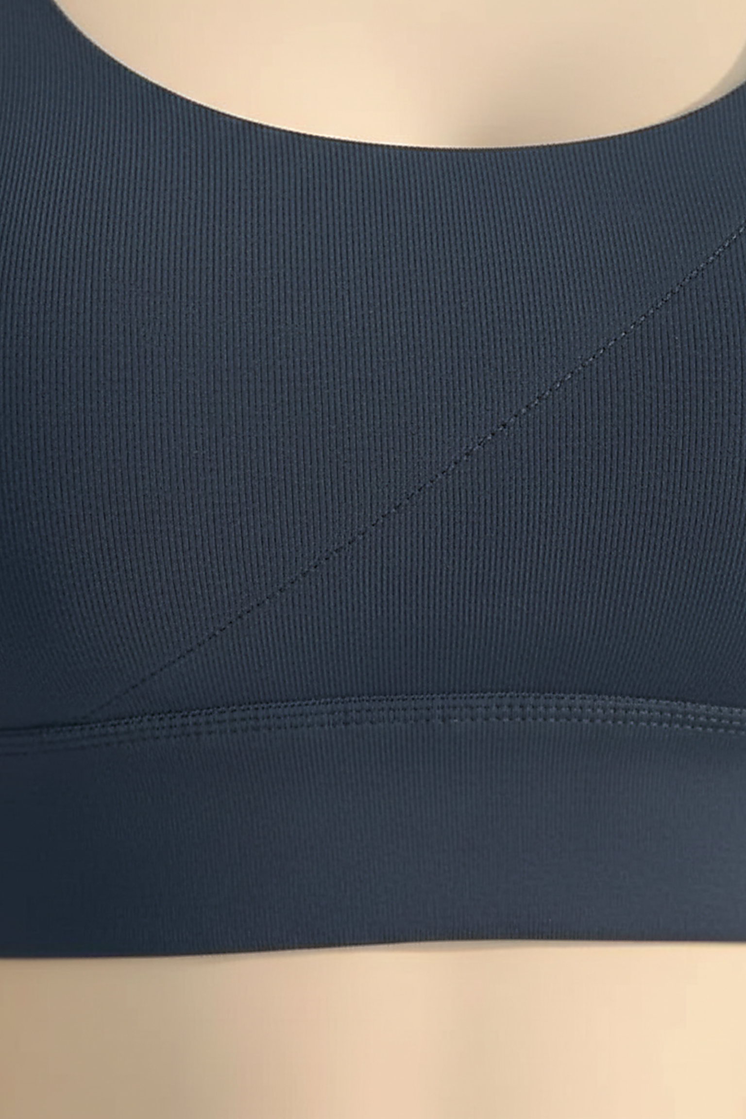 Seamless sports bra fabric detail, close-up view.