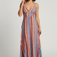Boho ethnic pattern long summer dress with frill trim, front view on model.