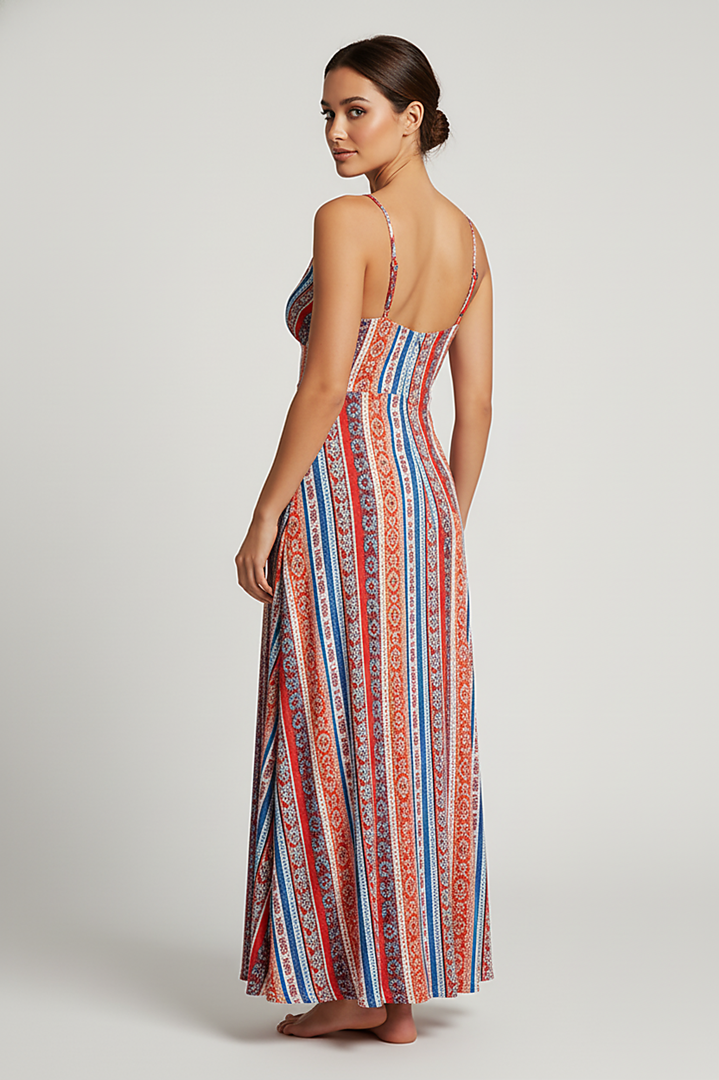Printed bohemian resort dress with ruffle detail, outdoor lifestyle.