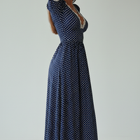 Elegant navy polka dot A-line maxi dress, V-neck, lace trim.