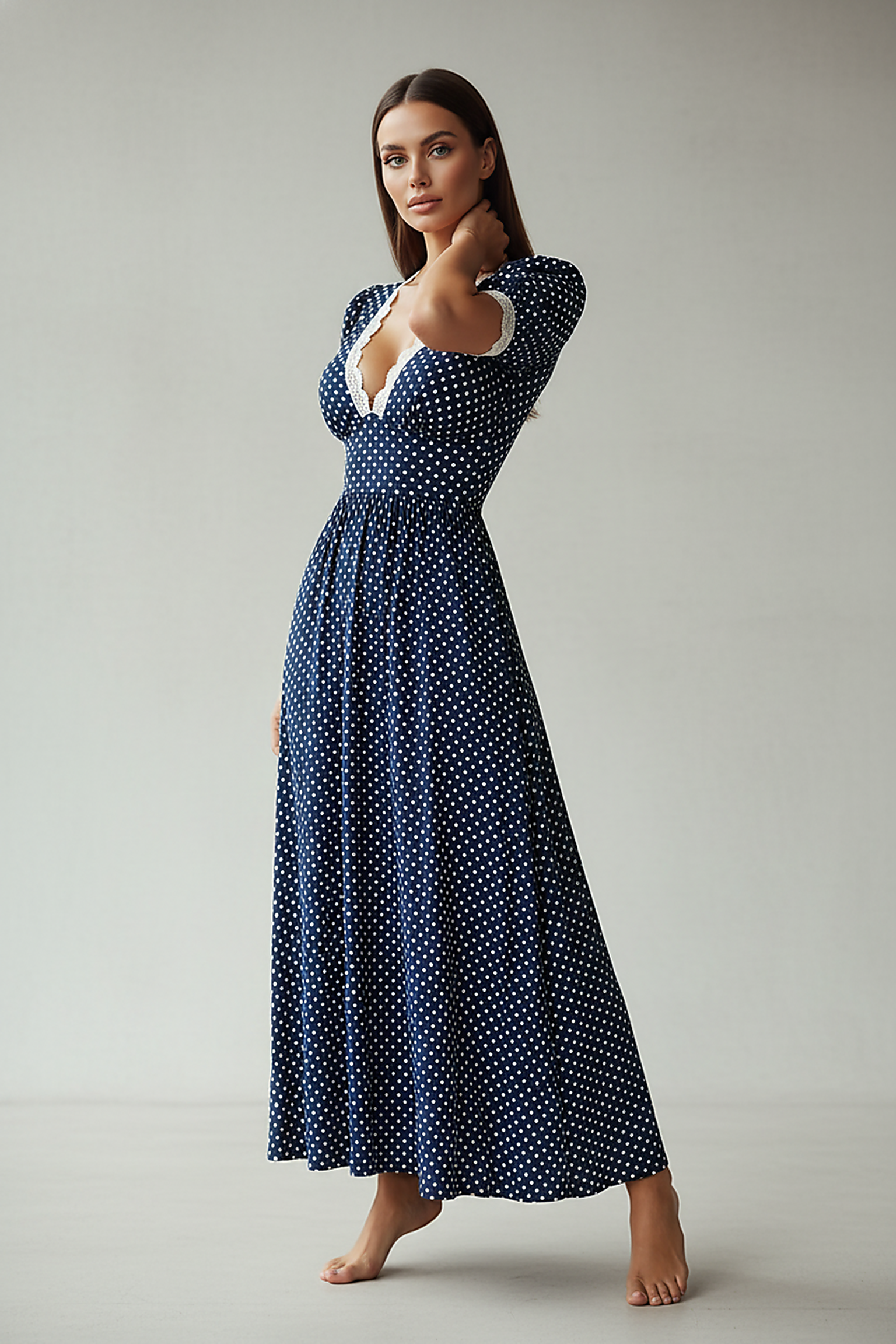 Navy polka dot cap sleeve summer maxi dress, front view.