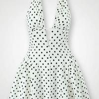 Sweet elegant retro polka dot halter mini dress, front view on model.