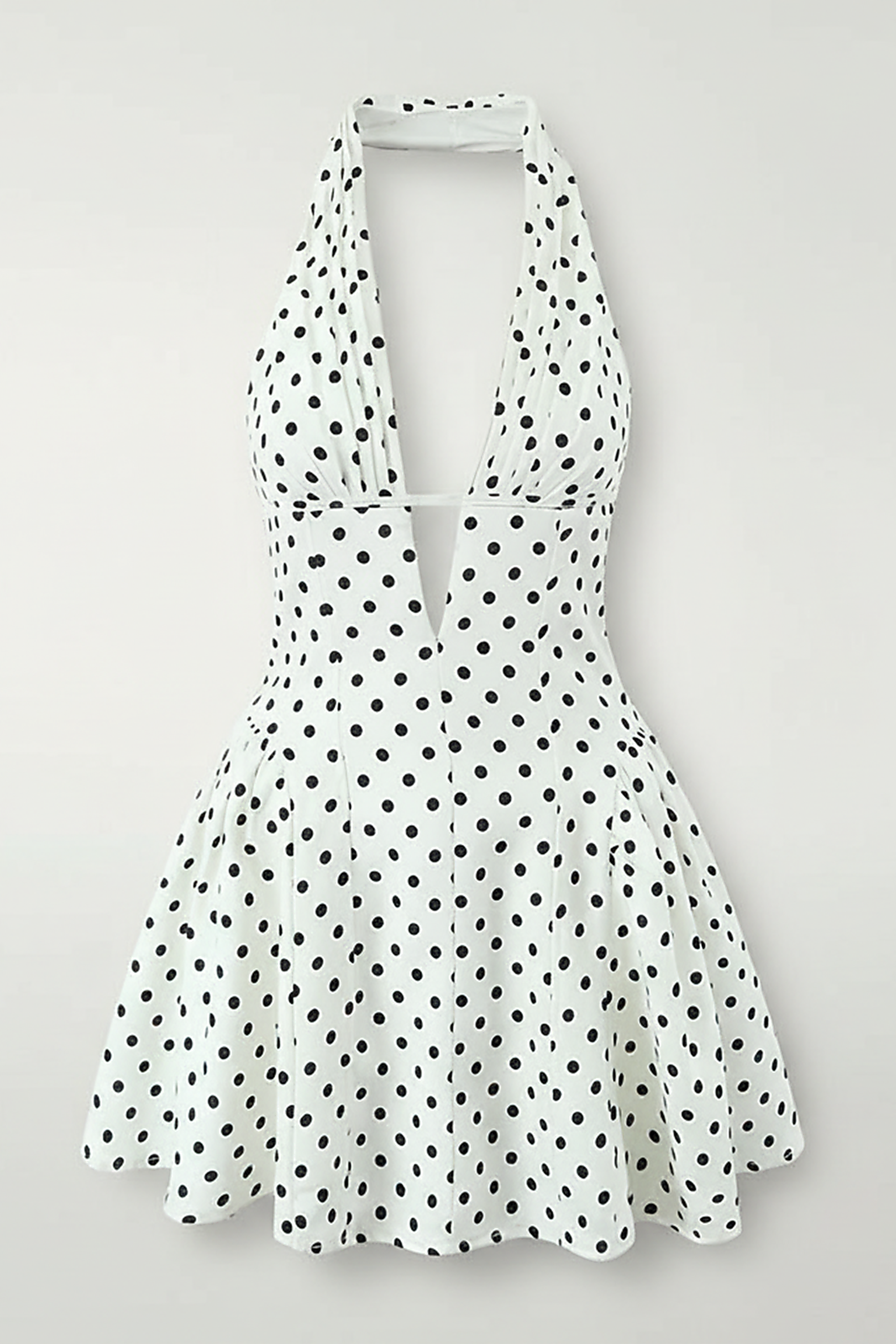 Sweet elegant retro polka dot mini dress, front view on model.