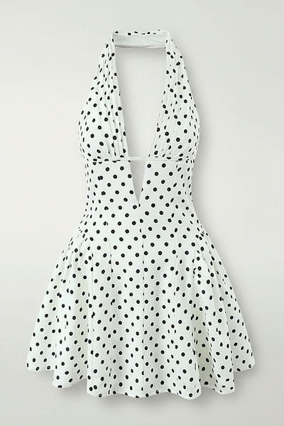 Sweet elegant retro polka dot mini dress, front view on model.