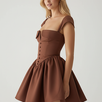 White short-sleeve mini dress, back view on model.