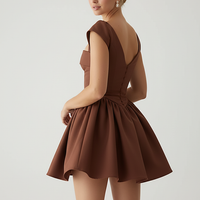 White short-sleeve mini dress, neckline detail.