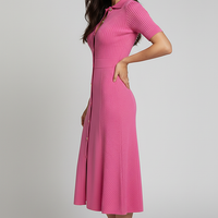 Spring summer knitted shirt dress, elegant party style, front view.