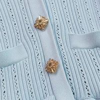 Knitted bodycon sweater dress, front view on model.