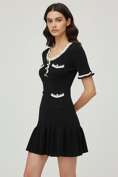 Knitted mini dress, back view on model.