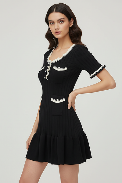 Knitted mini dress, front view on model.