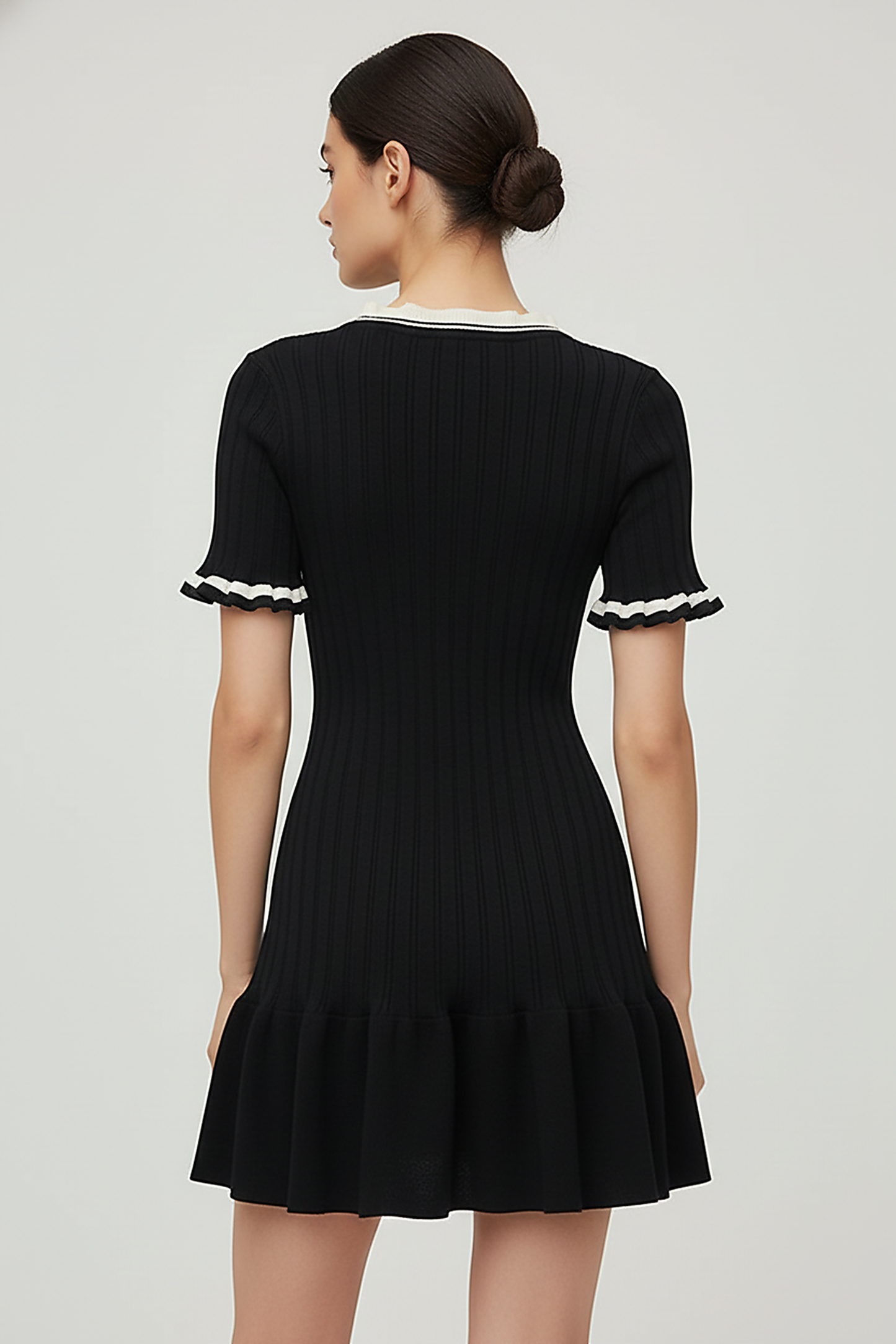 Knitted mini dress, fabric detail.