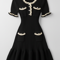 Knitted mini dress, detail shot.