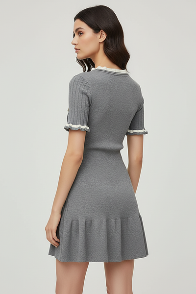 Knitted mini dress, model wearing dress.